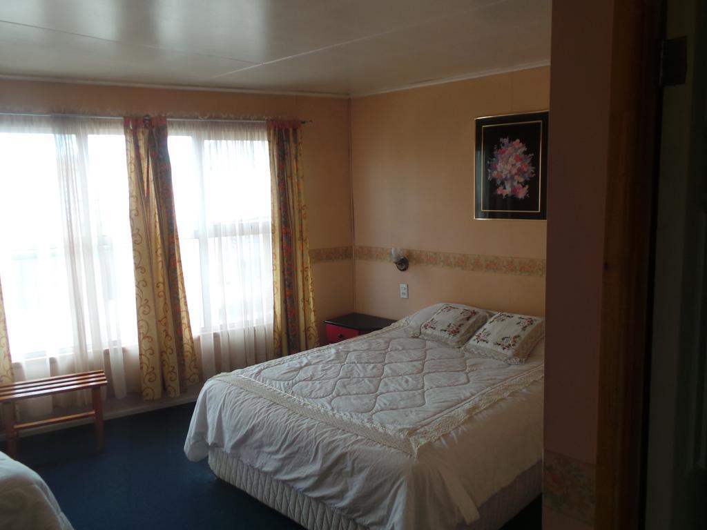Hostal South Wind I Пуэрто-Наталес Экстерьер фото